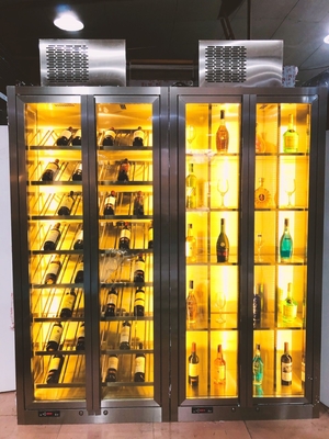 Gabinetti di vendita caldi del vino di qualità dell'espositore della bottiglia del liquore con il prezzo basso